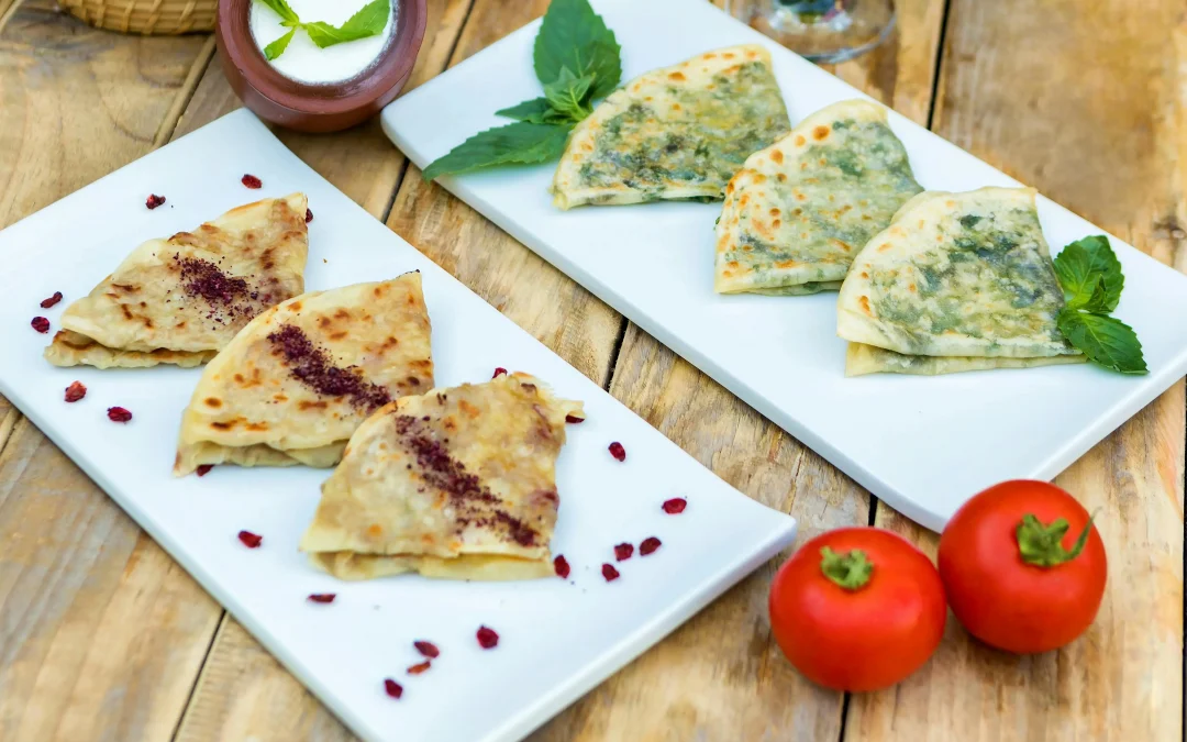 Kutab on plates on a wooden table with decor