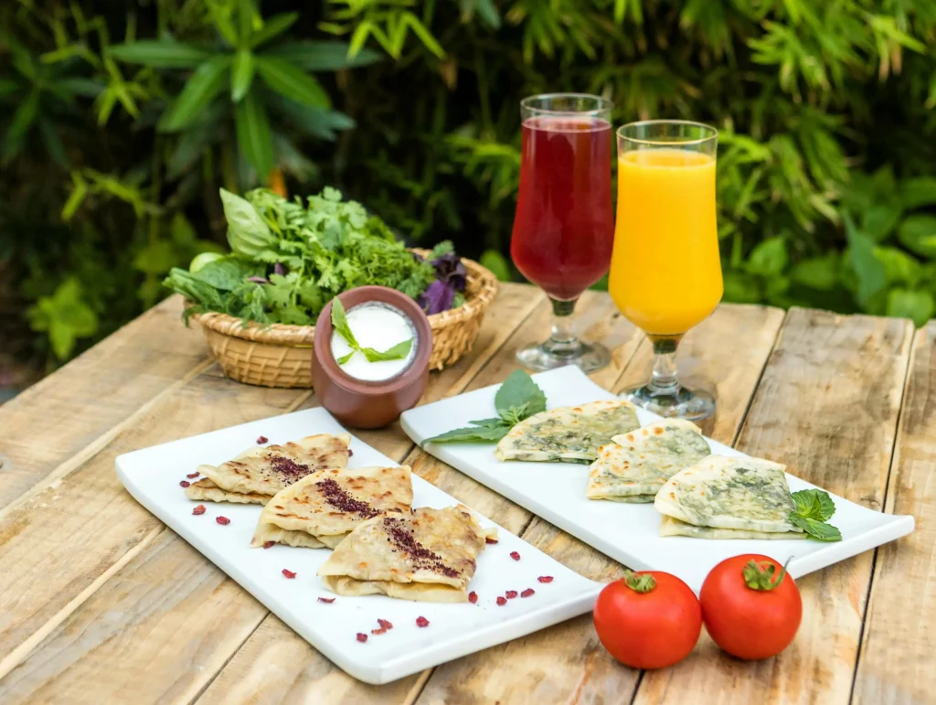 Kutab on plates on a wooden table with decor