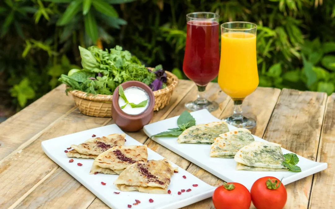 Kutab on plates on a wooden table with decor